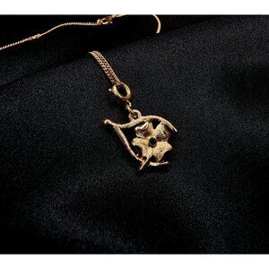 Vintage Monet Gold-Tone Necklace With Cloverleaf Pendant & Green Rhinestone Acce